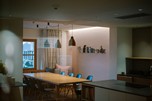 Room with a large table in the centre