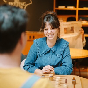 Couple playing a board game