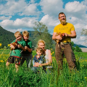 Family in flower meadow
