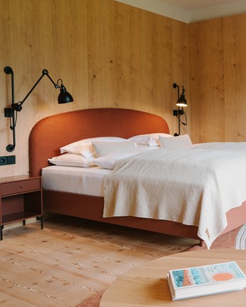 Hotel room lined with wood