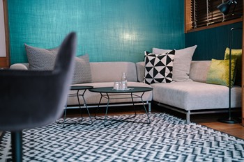Couch and coffee table in a turquoise room