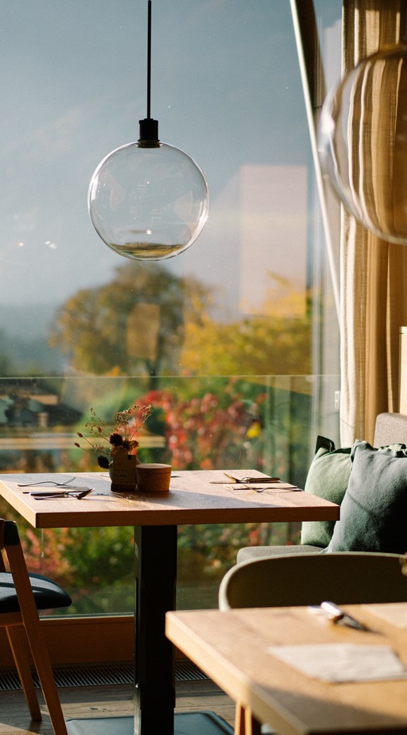 Tables in the restaurant in front of panoramic windows