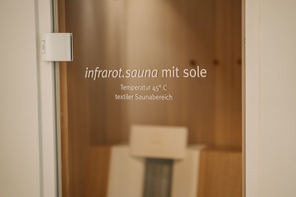 Glass door to the infrared sauna