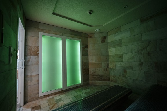 Green illuminated steam bath